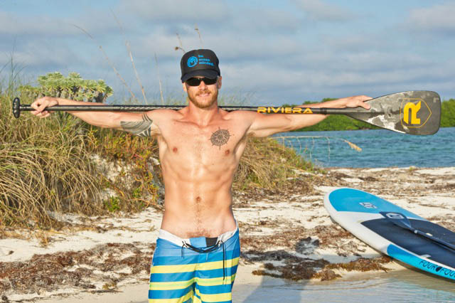 Nomadic SUP owner and operator Cody White paddleboards au naturel at Ballast Key, a private island eight miles west of Key West. Photo: Juan Pisani