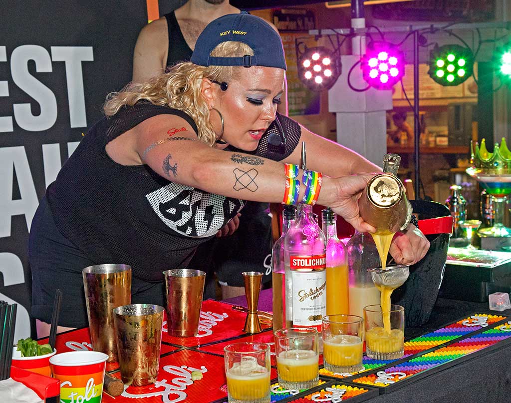 Kayla Hasbrook pours ingredients during the final round of the Stoli Key West Cocktail Classic contest Saturday, June 10, 2017, in Key West, Fla. Hasbrook, a New York City bartender, concocted a libation entitled “No Sleep Till Sunrise” to garner top honors among winners of 17 North American regional competitions. photo Credit: Carol Tedesco/Florida Keys News Bureau