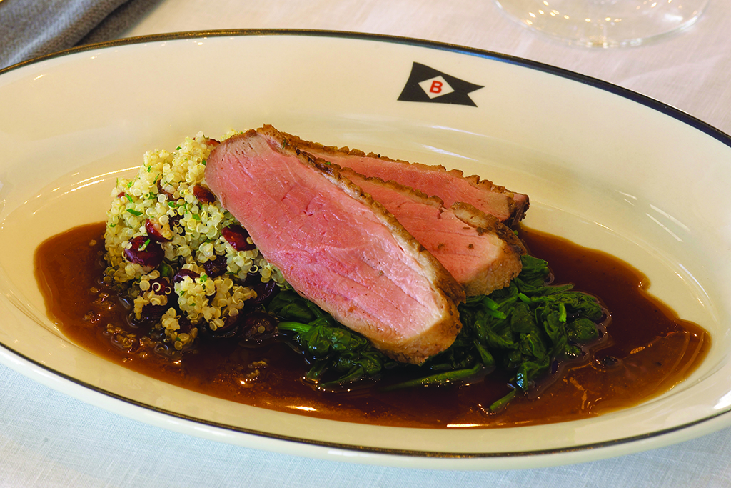 Baron's Cove Long Island Duck Breast with black cherry & quinoa pilaf, steamed spinach