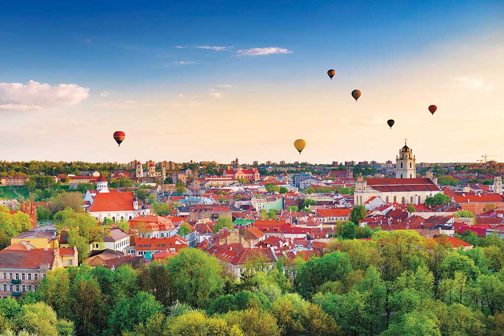 Vilnius with Hot Air Balloons in the Sky
