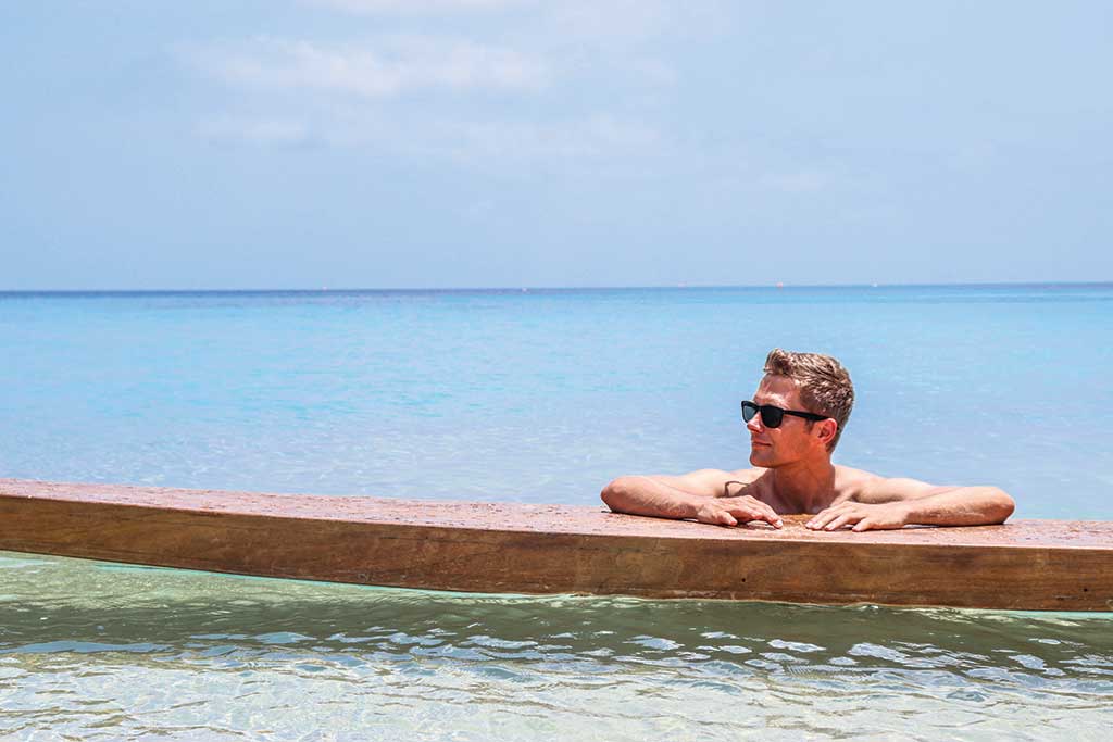 Guest Enjoying a Unique wooden paddle board