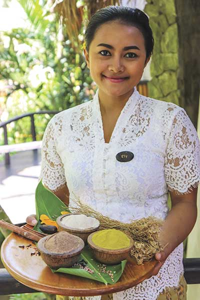 Massage Therapist With Balinese herbs and Spices