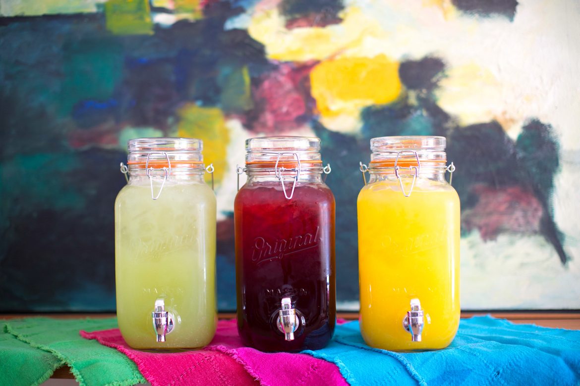 colorful jugs of Agua Fresca