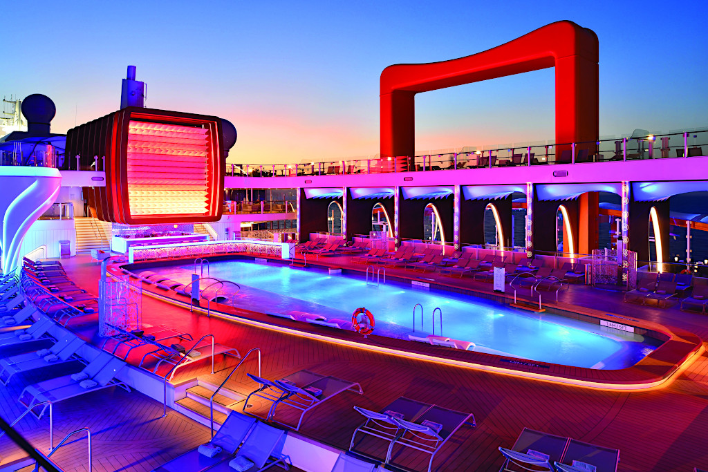 Main Pool Deck at Night on the Celebrity Apex Cruise Ship - Celebrity Cruises