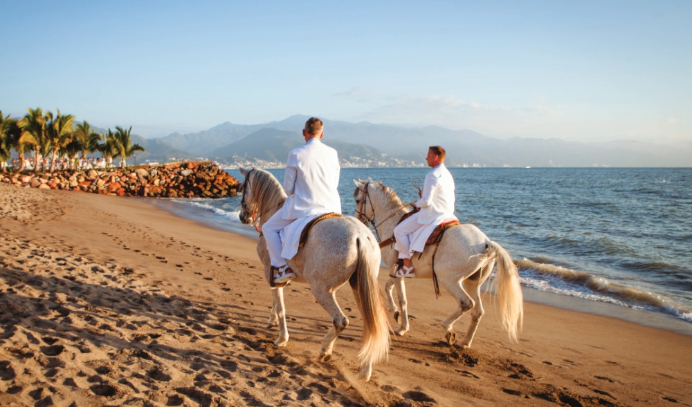 Newlyweds on the beach at Marriott Puerto Vallarta