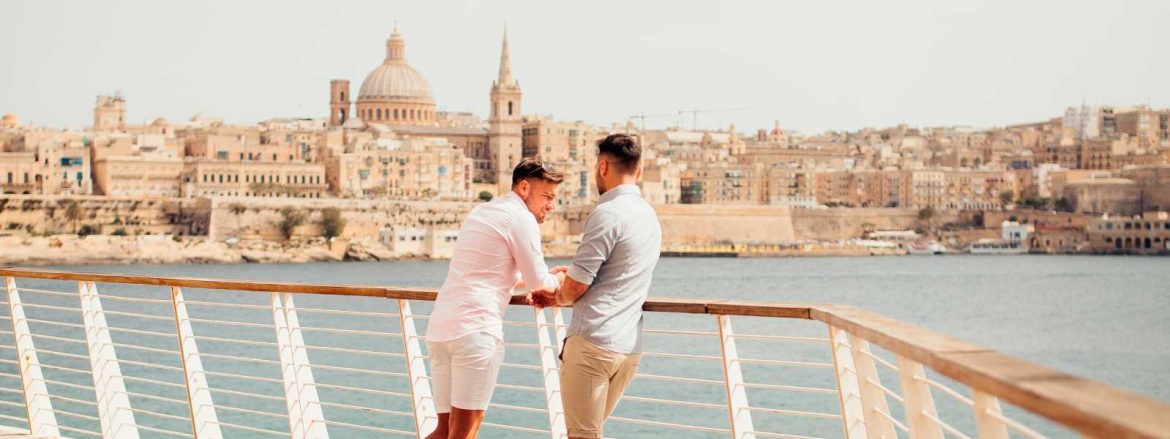 LGBT couple in Sliema, looking over to Valletta