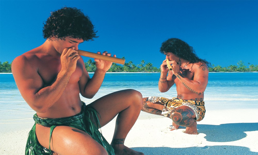 Tahitian Men Playing Nose Flutes (Photo courtesy of Pearl Beach Resort)