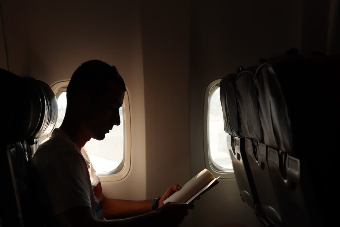 Airplane Reads (photo by Berkalp Turper)