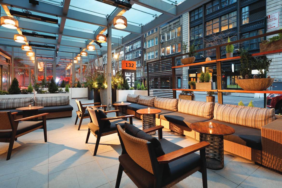 The Wilson Front Patio at Night (Photo by INNSIDE by Melia New York NoMad)