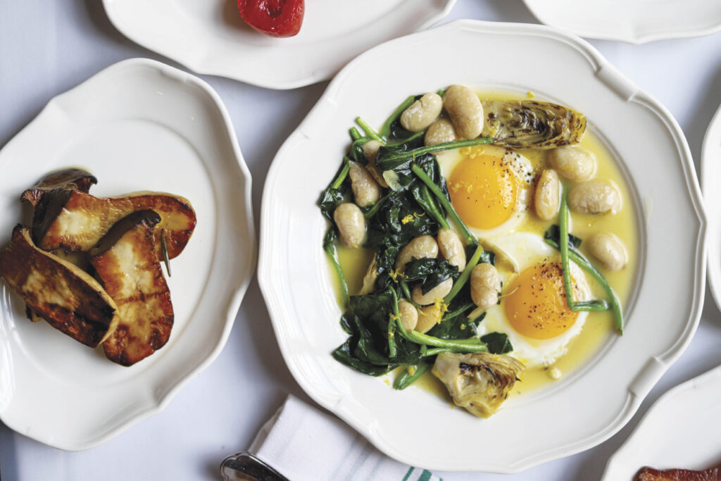 Eggs With Artichokes, Gigantes, Spinach & Trumpet Mushroom at Le Cocodile (Photo by Makani Kirwin)