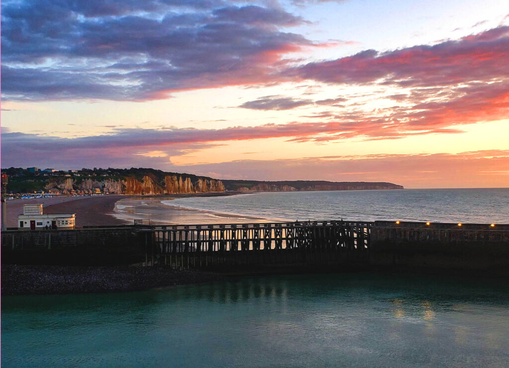 The Atmospheric Cliffs of Dieppe in the distance (Photo by C. Ludgate)