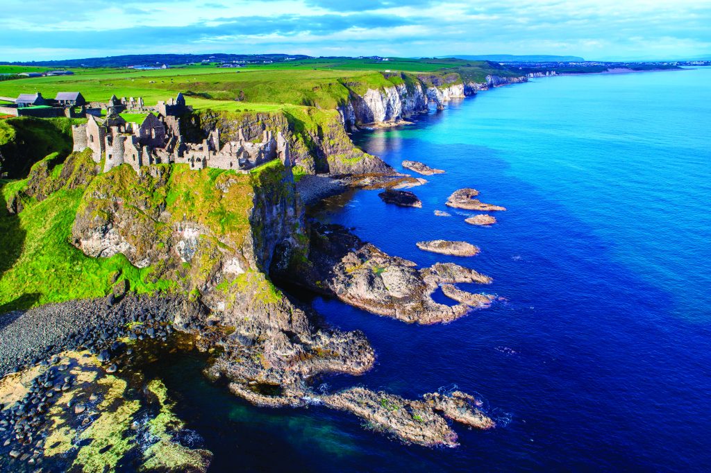 Ruins of Medieval Dunluce Castle on the Northern Coast of County Antrim (Photo by Nahlik)